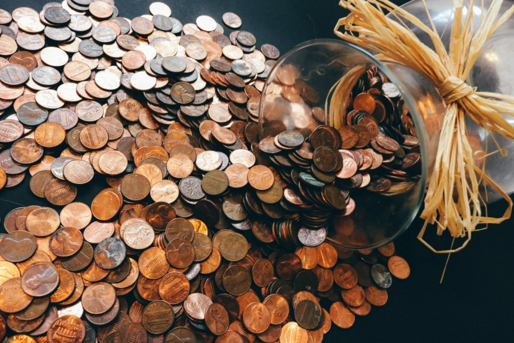 Pennies coming out of vase