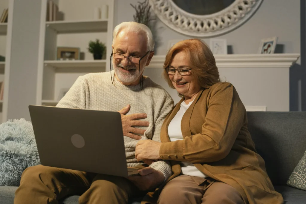 Senior couple looking at a computer