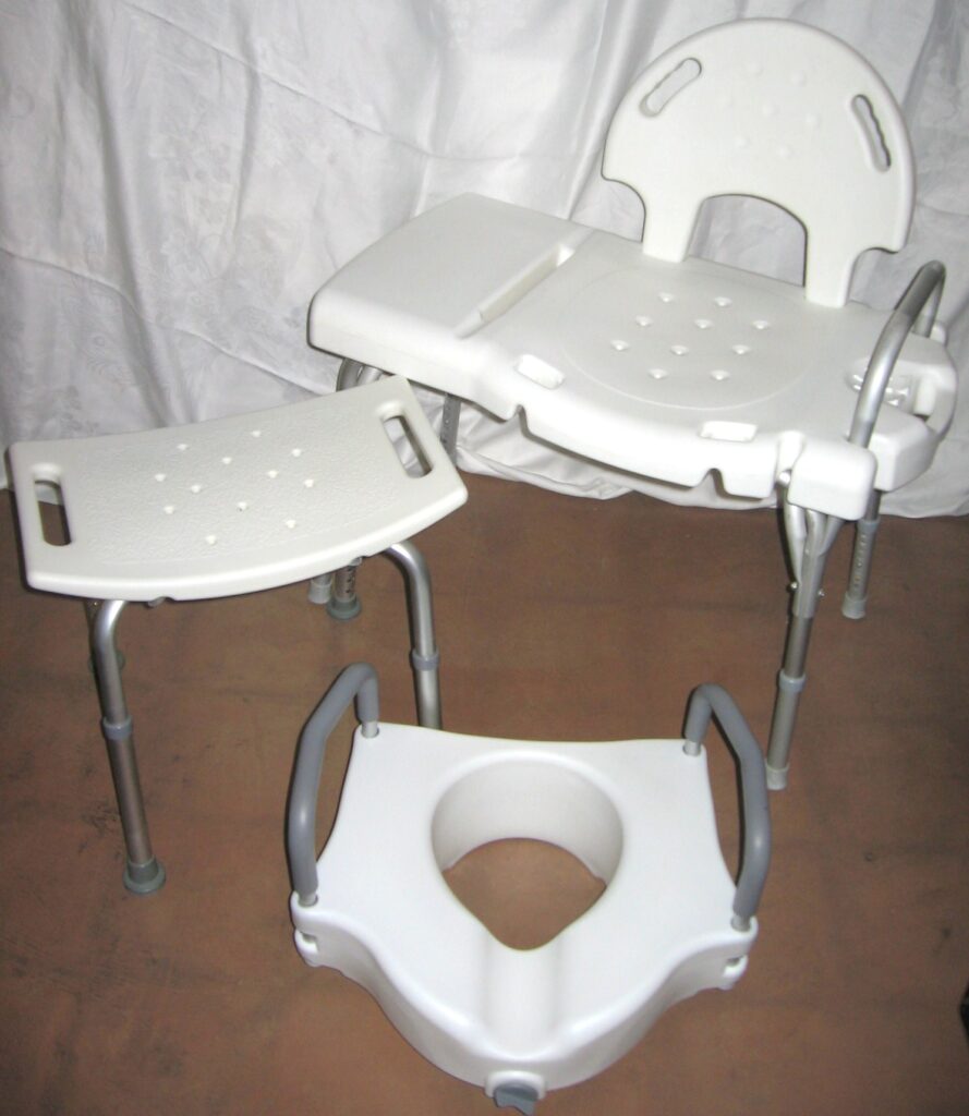 Raised toilet seat and handle bars